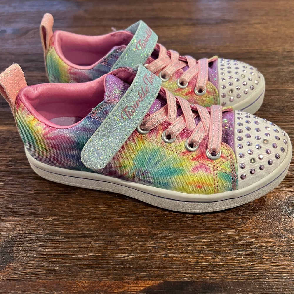 Twinkle toes, size 12.